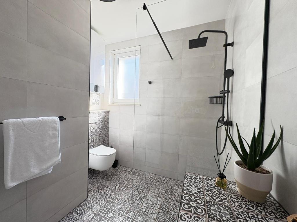 Kúpeľňa v ubytovaní Villa Štorija