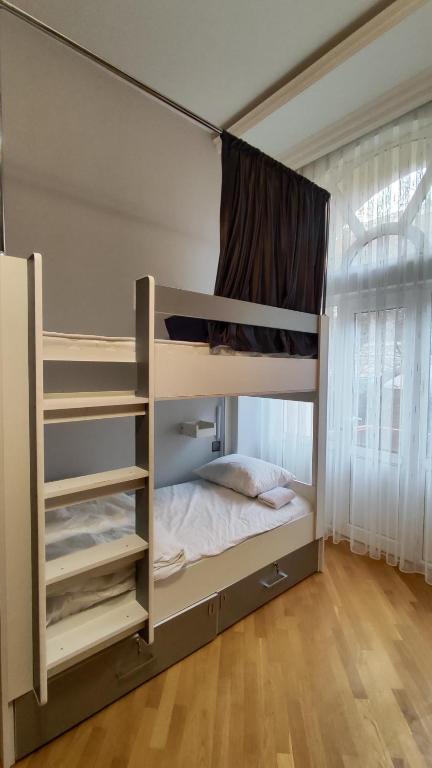 Postel nebo postele na pokoji v ubytování Gunel's Hostel Baku