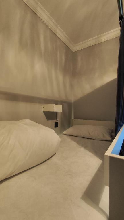 Postel nebo postele na pokoji v ubytování Gunel's Hostel Baku
