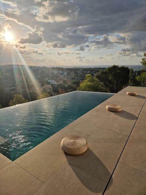 a swimming pool with a view of the city at Noahs Paradise in Benissa