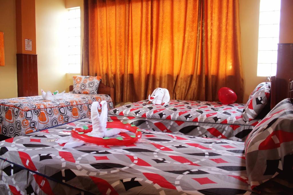 Una cama o camas en una habitación de Hostal Ventura Isabel