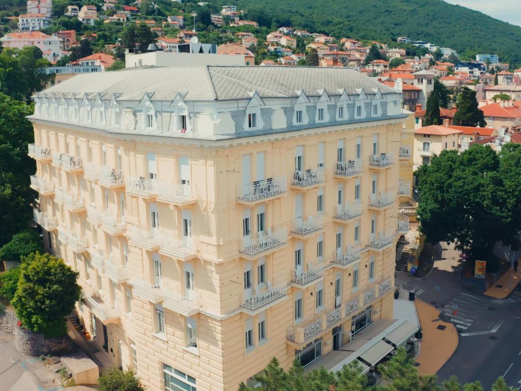 an aerial view of a building in a city at BRISTOL Hotel Opatija in Opatija
