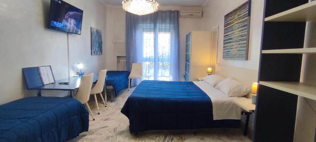 A bed or beds in a room at GIAMBATTISTA HOUSE BARI