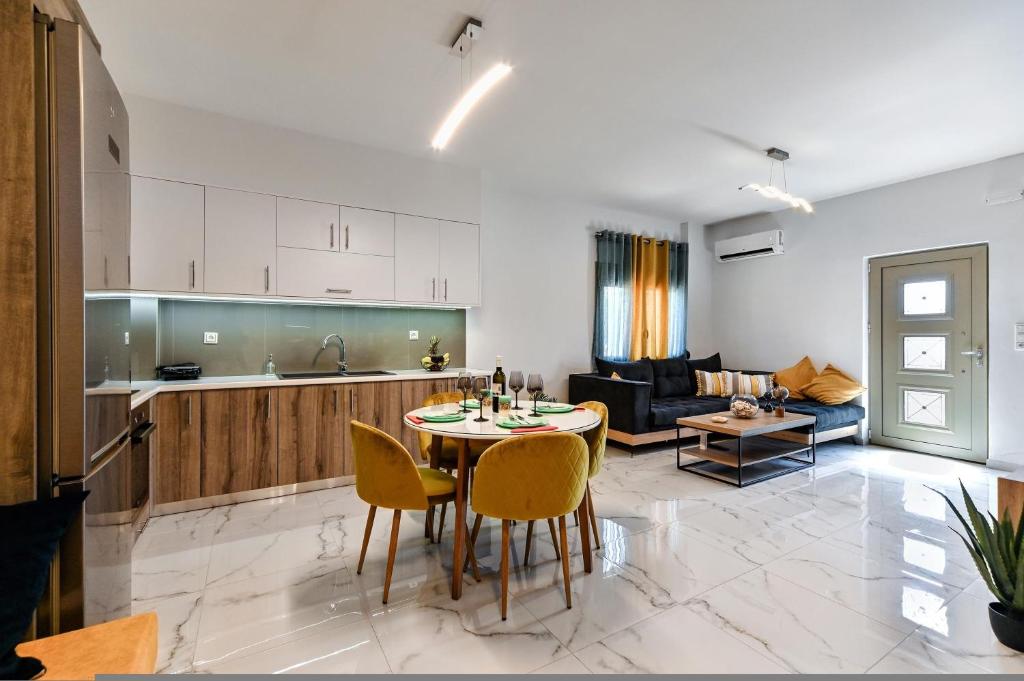 A kitchen or kitchenette at Seaside Apartments in Agkisaras 2