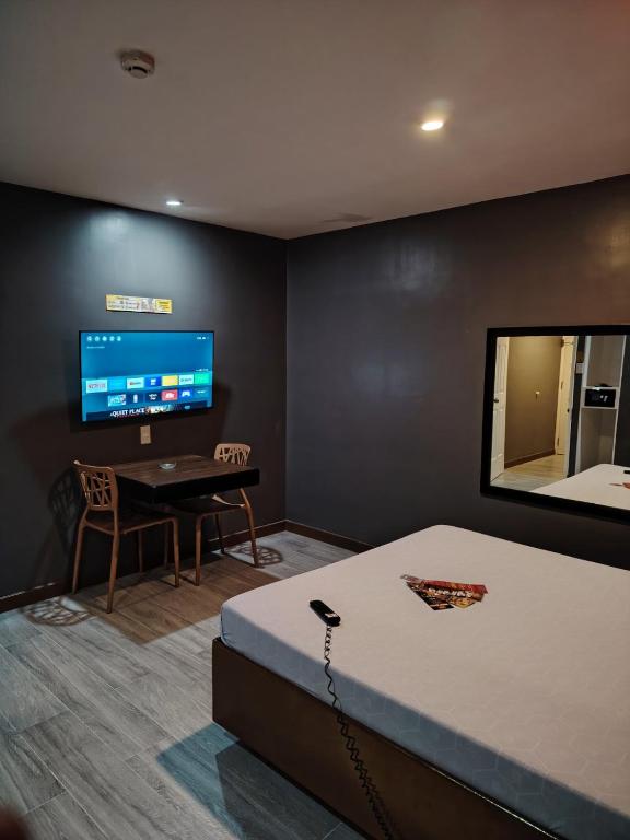 TV a/nebo společenská místnost v ubytování Hotel Sogo Quirino