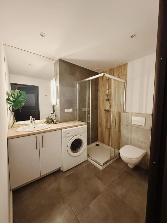 Kúpeľňa v ubytovaní Apartament Egzotyczny