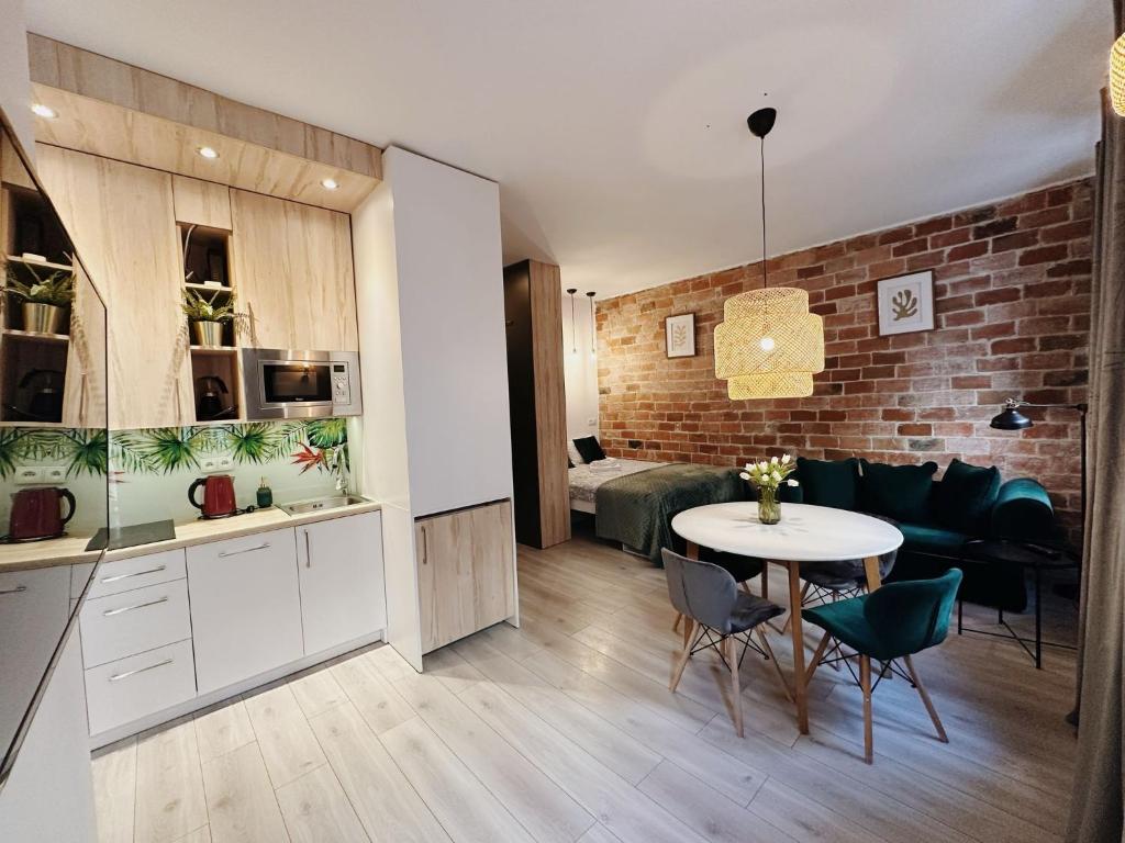 Kuchyňa alebo kuchynka v ubytovaní Apartament Egzotyczny