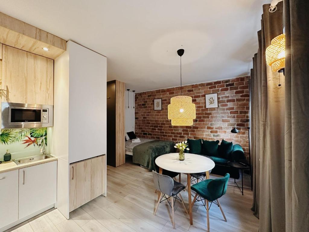 Kuchyňa alebo kuchynka v ubytovaní Apartament Egzotyczny