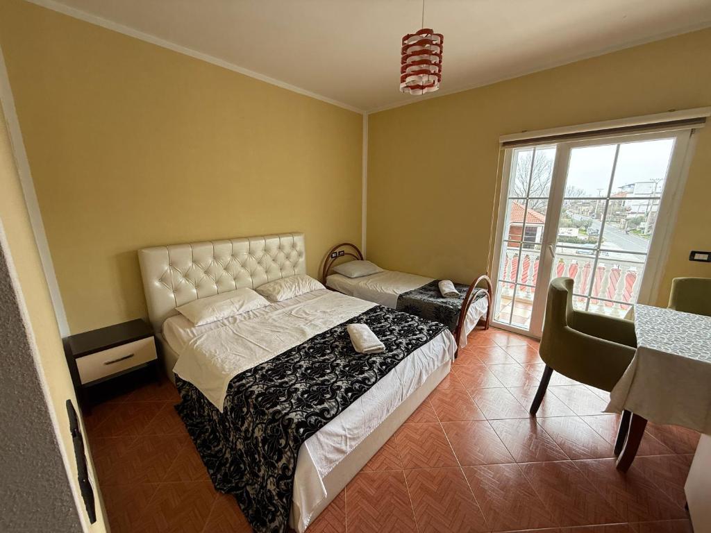Postel nebo postele na pokoji v ubytování Hotel Fantazia
