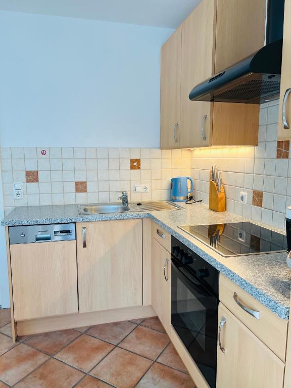 Kuchyň nebo kuchyňský kout v ubytování Alpenruhe Residenz