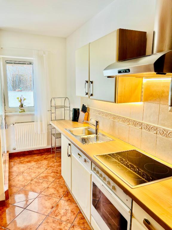 Kuchyň nebo kuchyňský kout v ubytování Alpenruhe Residenz