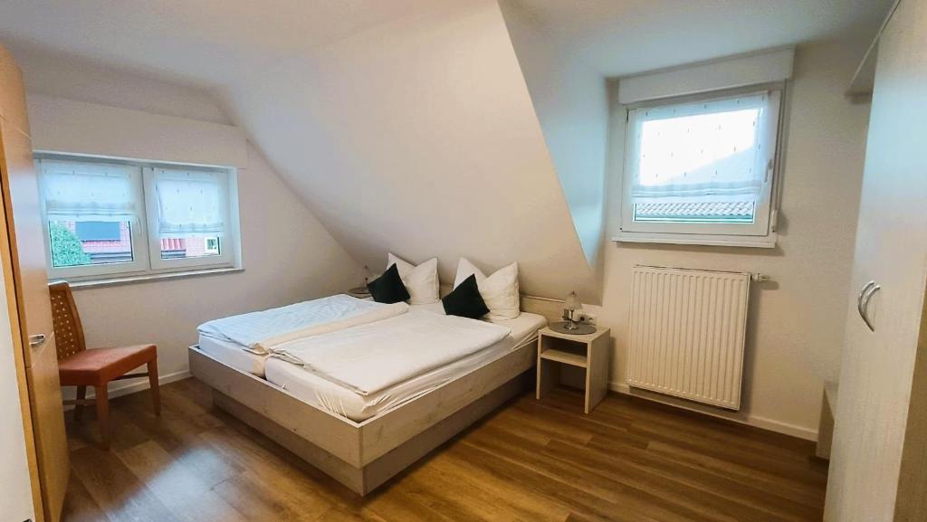 Postel nebo postele na pokoji v ubytování Hotel Pieper-Kersten