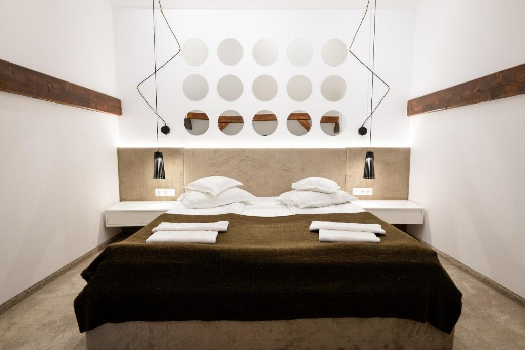 Postel nebo postele na pokoji v ubytování Hotel Szeifert
