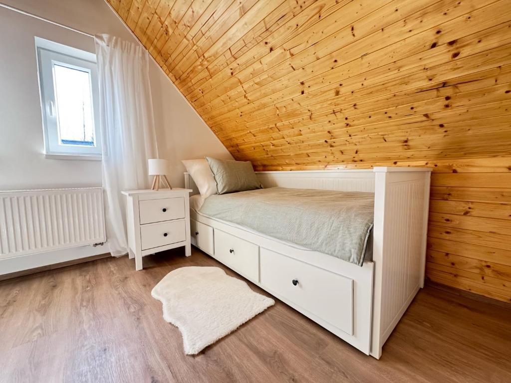 Postel nebo postele na pokoji v ubytování Domek na Vysočině
