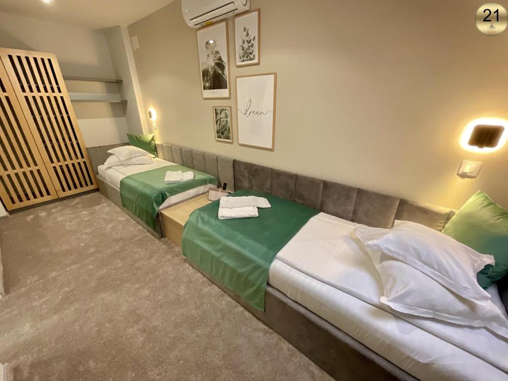 Postel nebo postele na pokoji v ubytování Hotel Szeifert