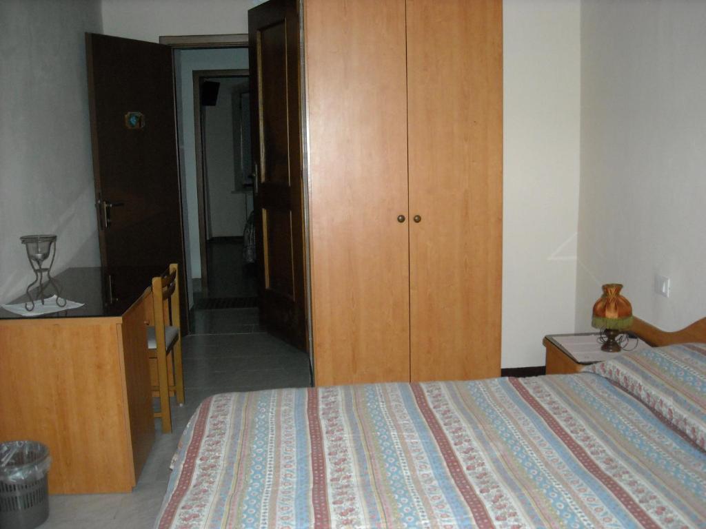 Postel nebo postele na pokoji v ubytování B&B Corte Bezzetti