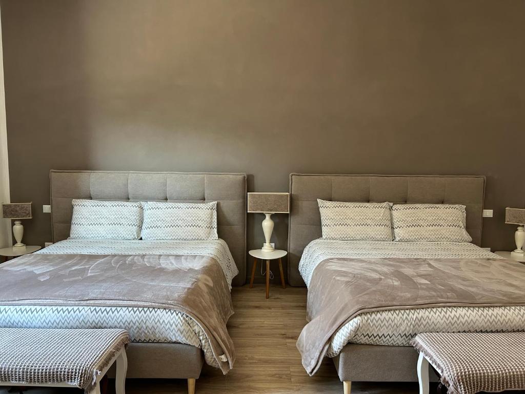 Postel nebo postele na pokoji v ubytování Residenza Guglielmo