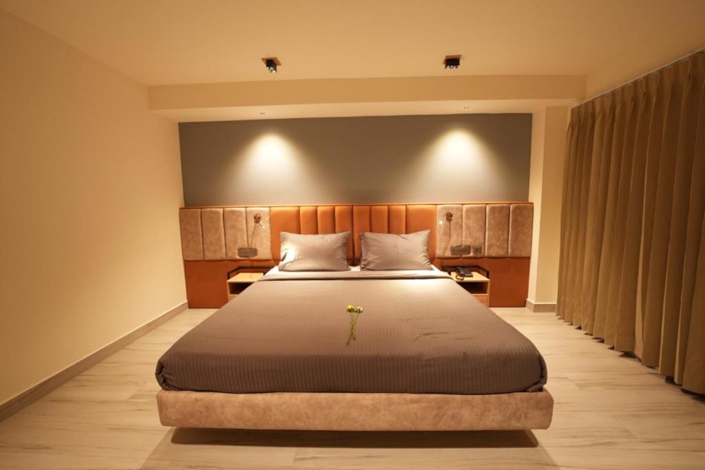 En eller flere senge i et værelse på AURA Crimson Vistas