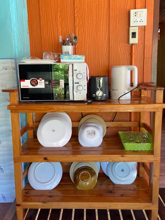 Kuchyň nebo kuchyňský kout v ubytování Patcharin Homestay
