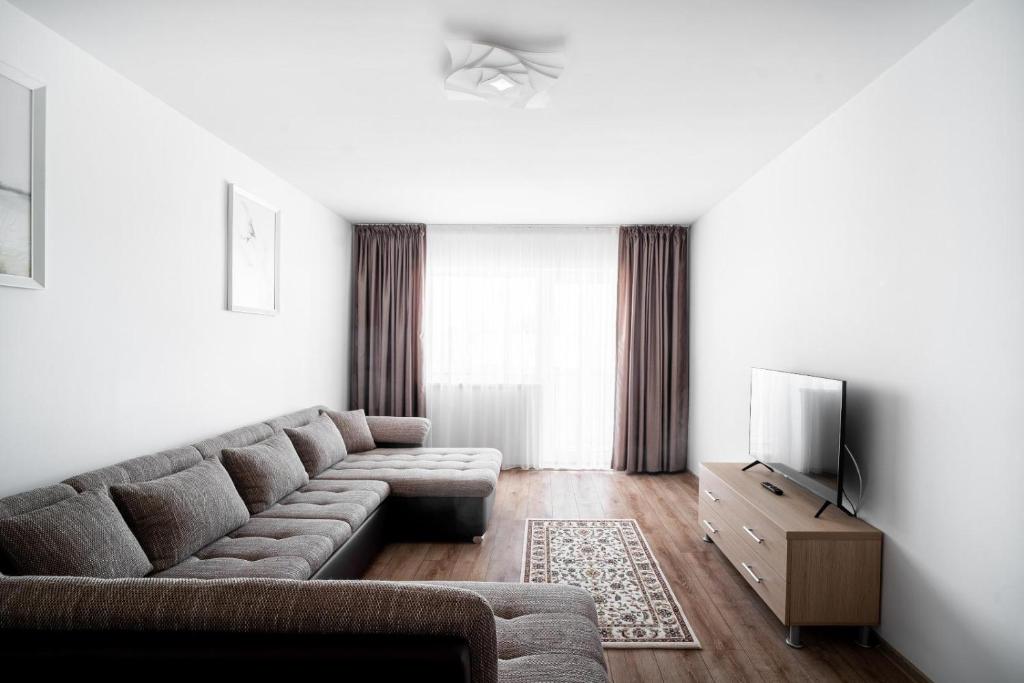 TV a/nebo společenská místnost v ubytování Nice & Cozy Sulina