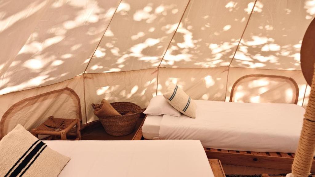 Cama o camas de una habitación en Tres Estrellas Camí de Sirga Mequinenza