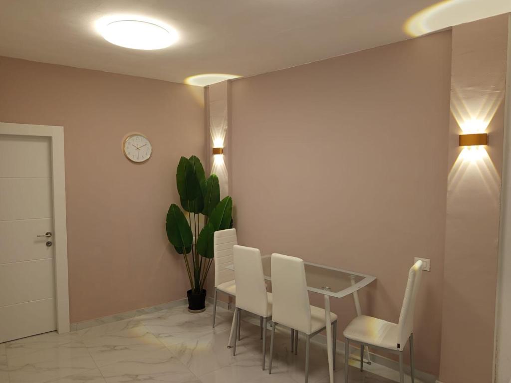 Posezení v ubytování PERGOLA HOUSE 3 BDR heart