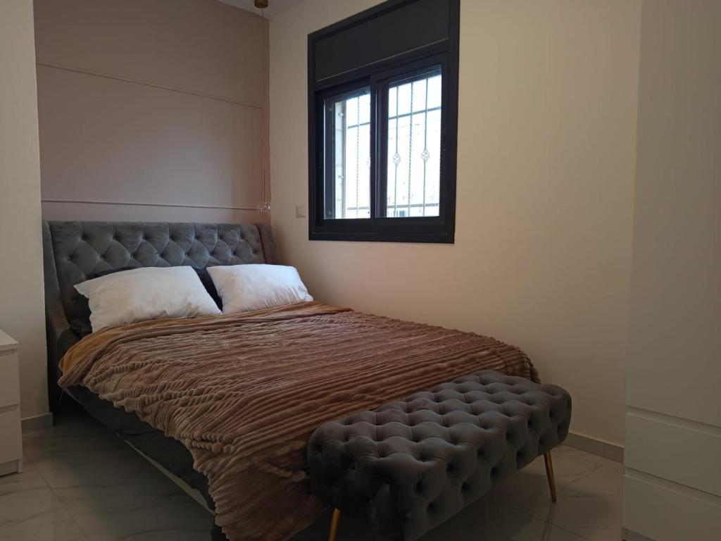 Postel nebo postele na pokoji v ubytování PERGOLA HOUSE 3 BDR heart