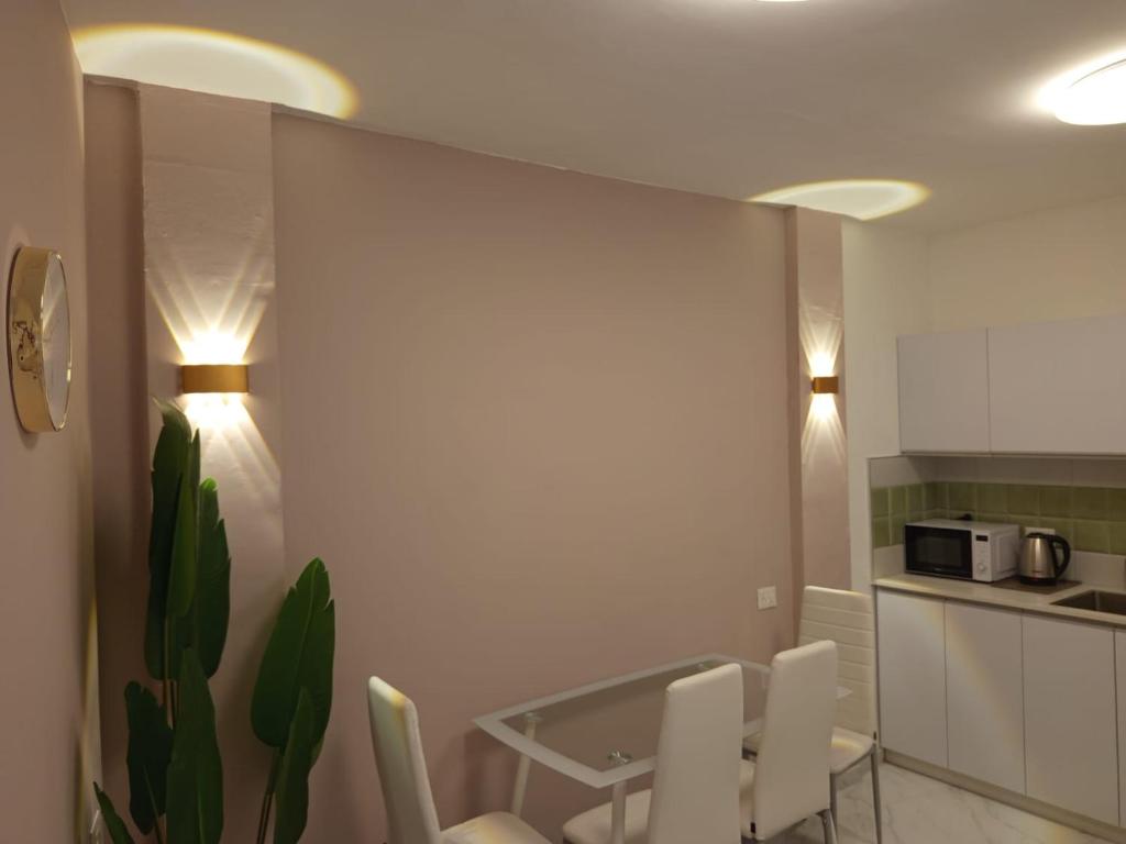 Kuchyň nebo kuchyňský kout v ubytování PERGOLA HOUSE 3 BDR heart
