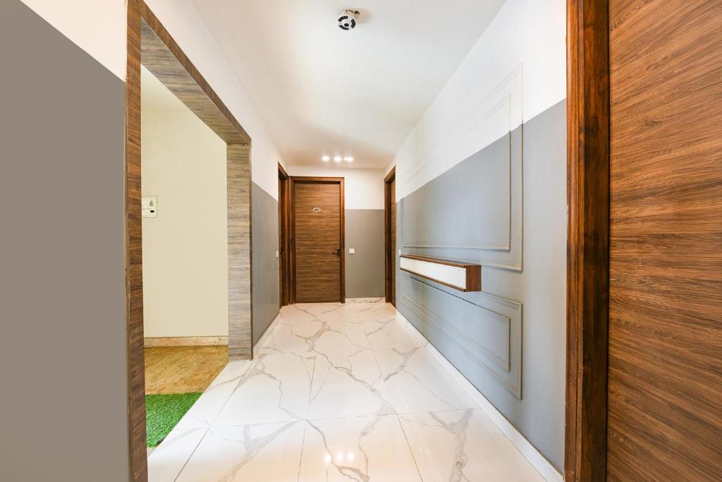 Postel nebo postele na pokoji v ubytování FabHotel Micasa
