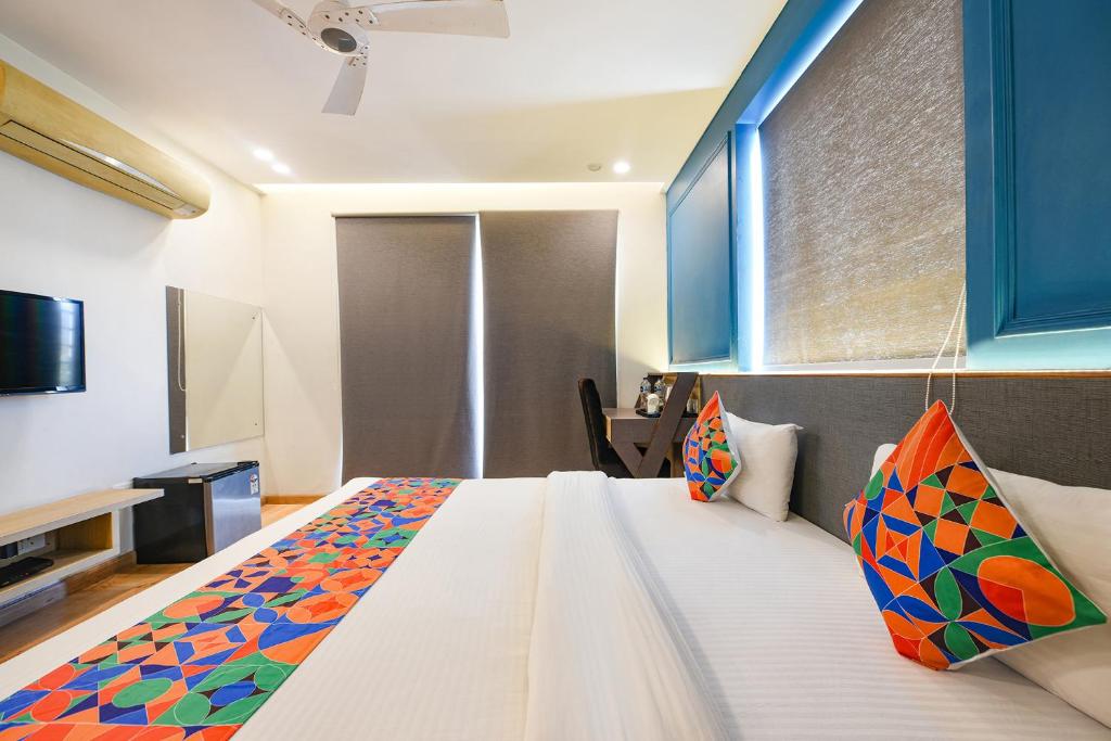 Postel nebo postele na pokoji v ubytování FabHotel Micasa