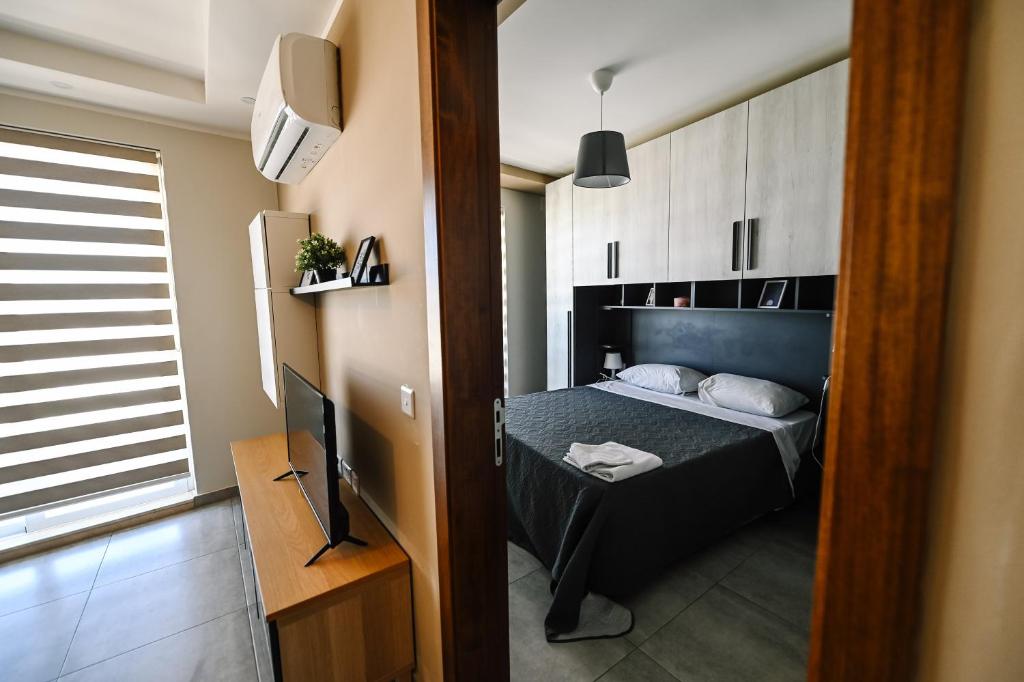 Postel nebo postele na pokoji v ubytování Cerviola Graziosa Court