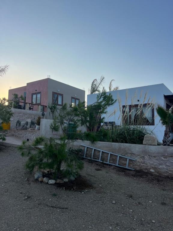 a couple of buildings with plants in front of them at The Ocean Breeze bungalow in Sidi Kaouki