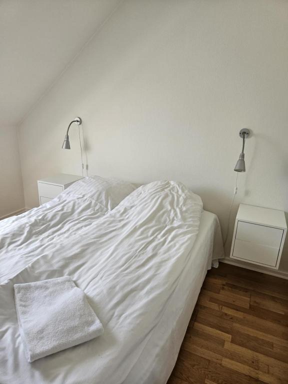 Postel nebo postele na pokoji v ubytování Kirke Såby Forsamlingshus
