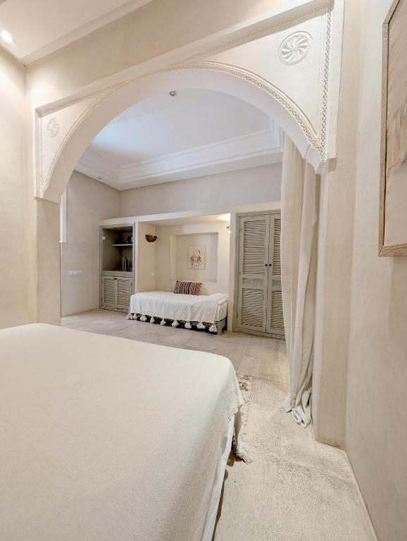 Postel nebo postele na pokoji v ubytování Riad Slitine & Spa