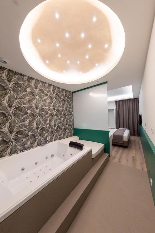 Postel nebo postele na pokoji v ubytování Smart Hotel Napoli