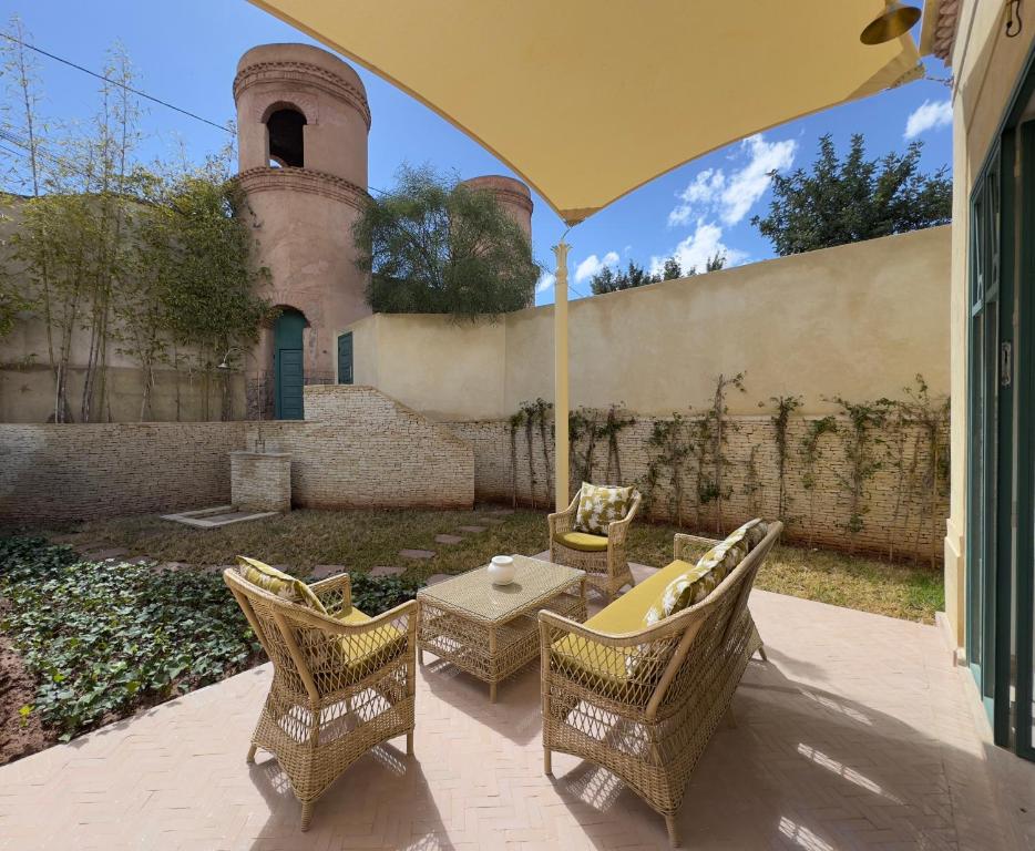Patio nebo venkovní prostory v ubytování Les Deux Tours