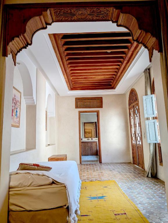 Postel nebo postele na pokoji v ubytování Riad Slitine & Spa