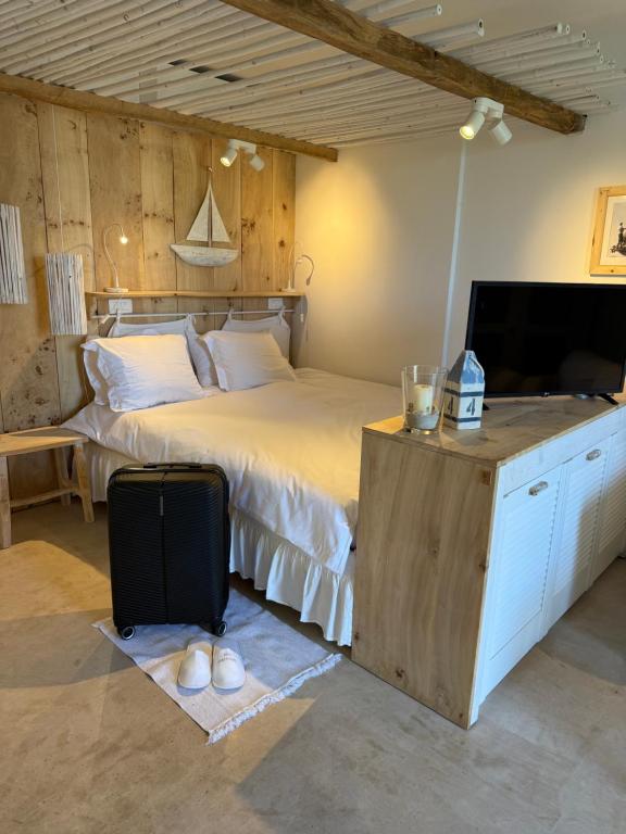 Postel nebo postele na pokoji v ubytování Pavi apartments Vila Amalia