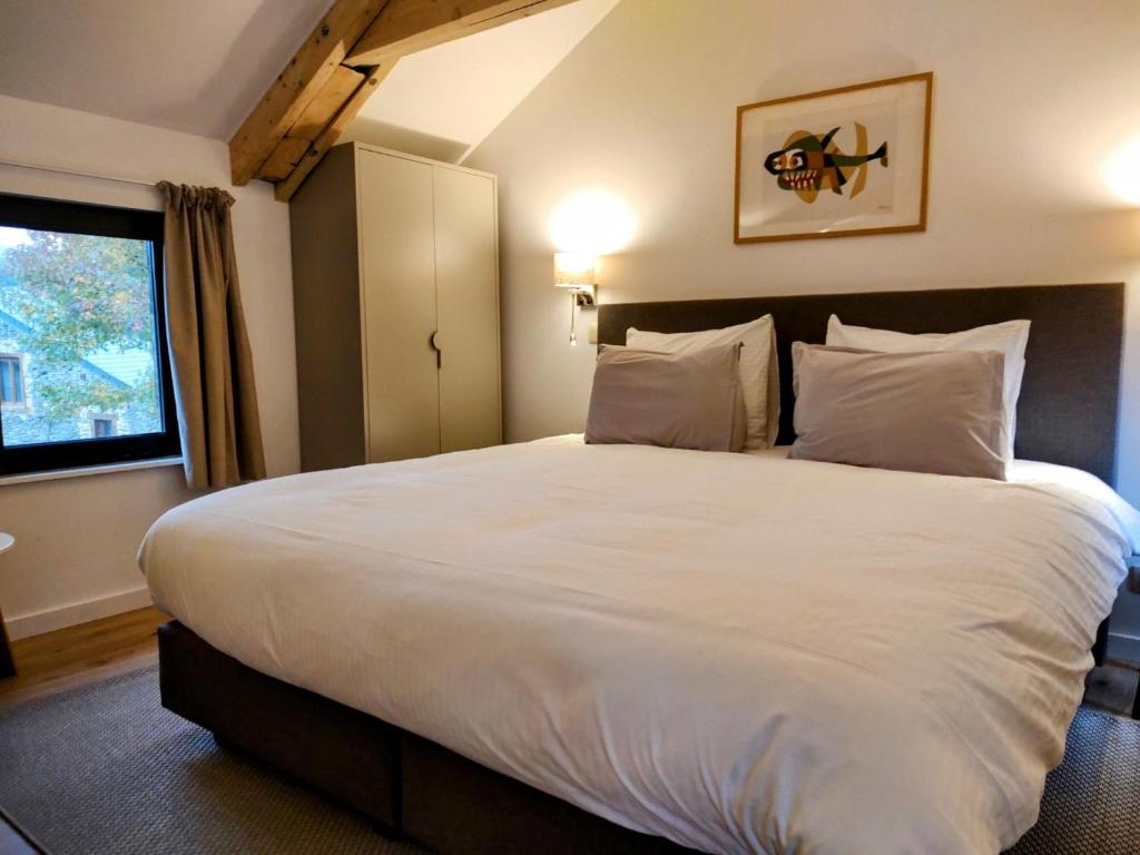 Postel nebo postele na pokoji v ubytování B&B La Belle Histoire Laforêt