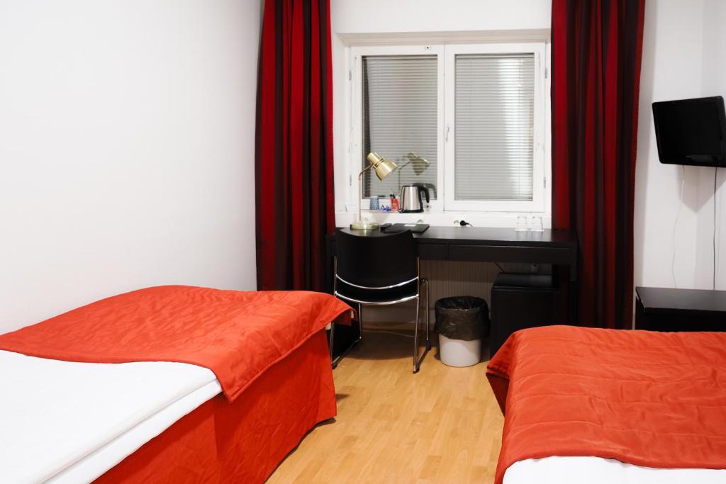 Postel nebo postele na pokoji v ubytování Finlandia Park Hotel Helsinki