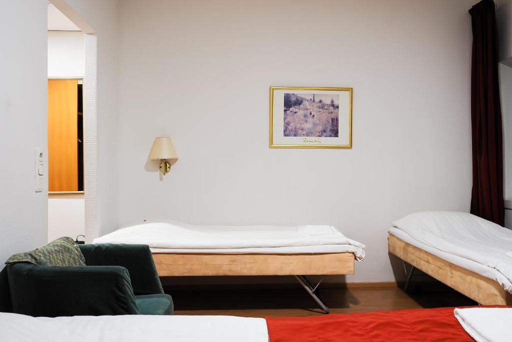 Postel nebo postele na pokoji v ubytování Finlandia Park Hotel Helsinki