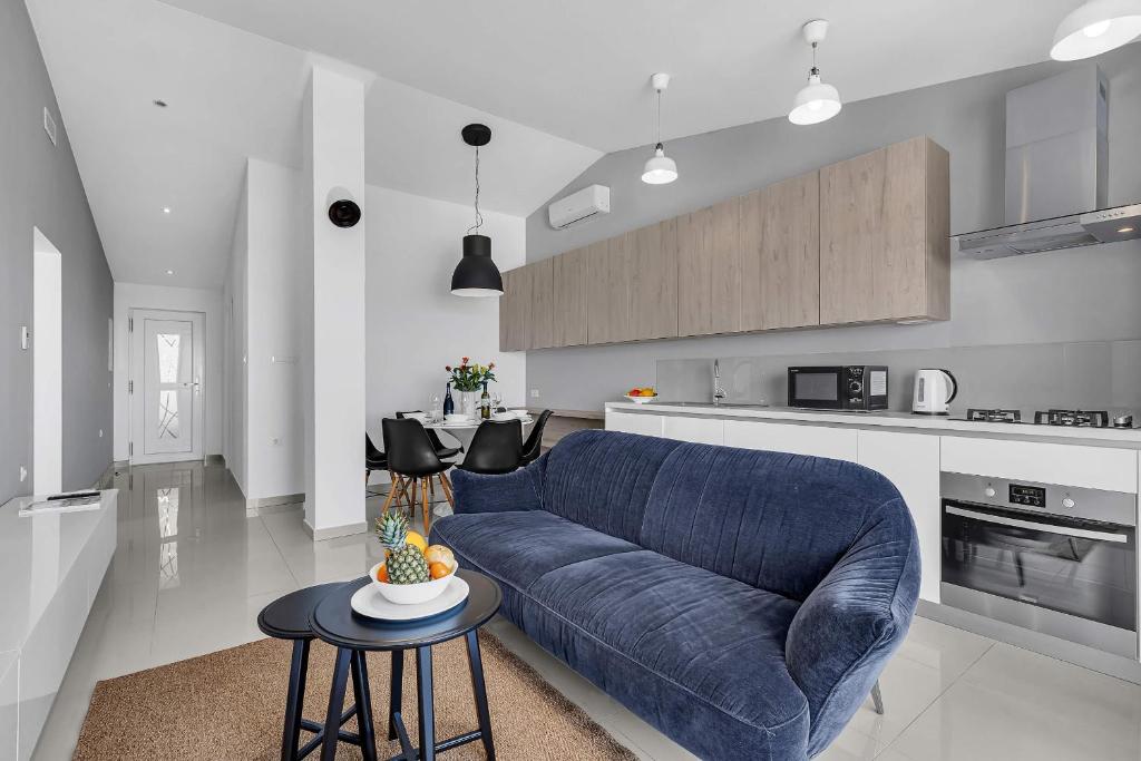 Kuchyň nebo kuchyňský kout v ubytování Blue Dream Apartment