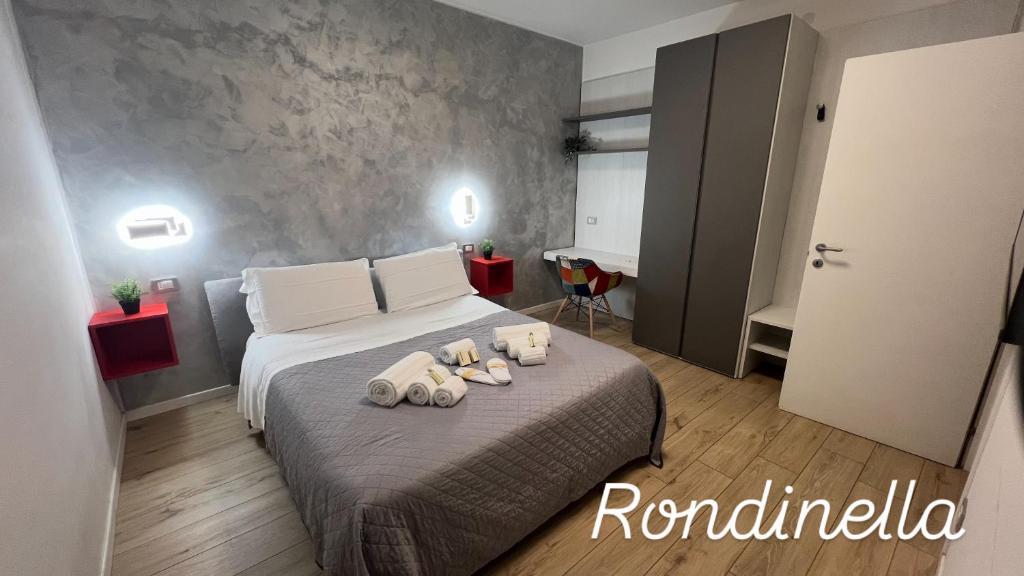 Posteľ alebo postele v izbe v ubytovaní san rocco apartments