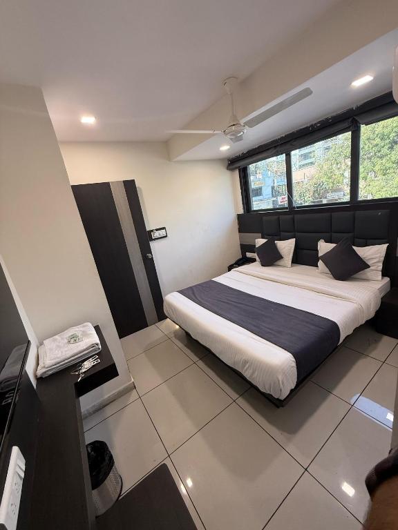 Postel nebo postele na pokoji v ubytování Hotel Sunview