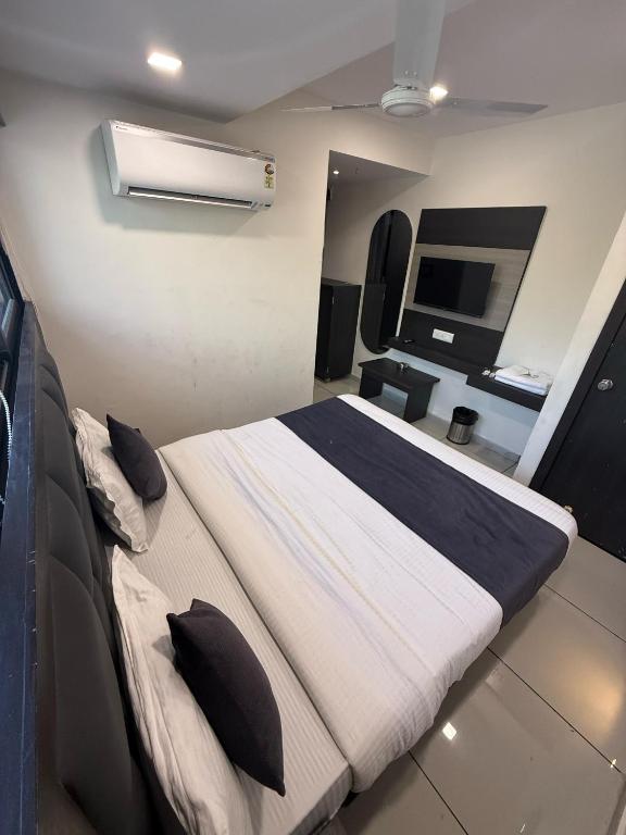 Postel nebo postele na pokoji v ubytování Hotel Sunview