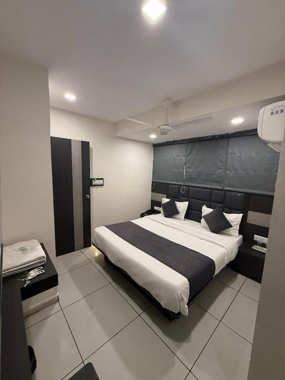 Postel nebo postele na pokoji v ubytování Hotel Sunview