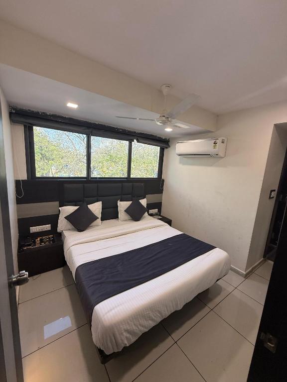 Postel nebo postele na pokoji v ubytování Hotel Sunview