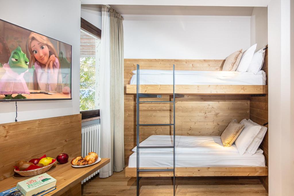 Cama o camas de una habitación en Hotel Nigritella