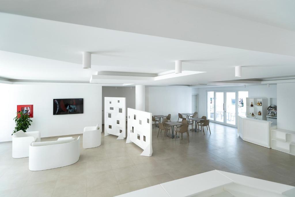 TV a/nebo společenská místnost v ubytování Vasto Aparthotel