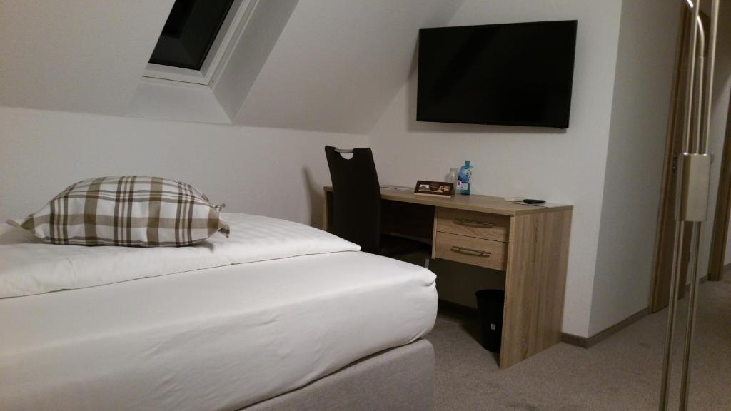 Postel nebo postele na pokoji v ubytování Hotel Bohlje